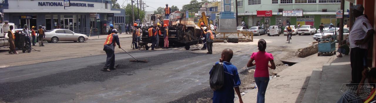 Workmen repairing road way in Old Harbour Square