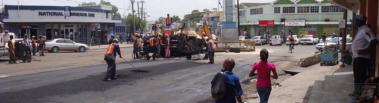 Workmen repairing Old Harbour Square